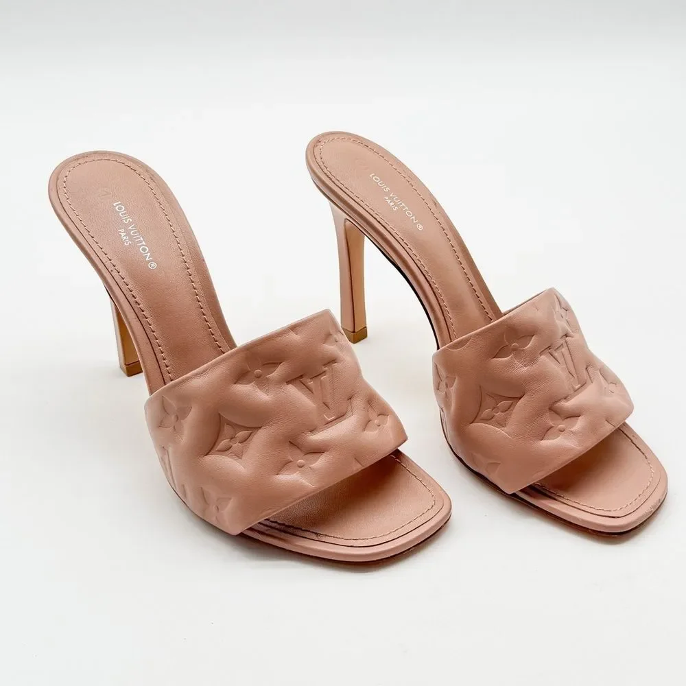 Louis Vuitton Revival Mule Heel Sandals Beige
Monogram Embossed Leather EU 38 - Picture 2 of 14